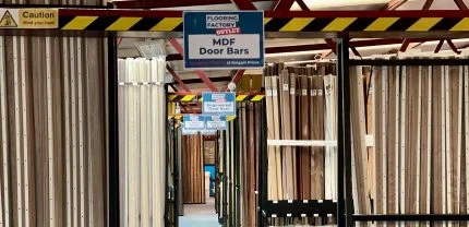 Various designs of door bars and flooring accessories displayed at Flooring Factory Outlet's Croydon showroom.