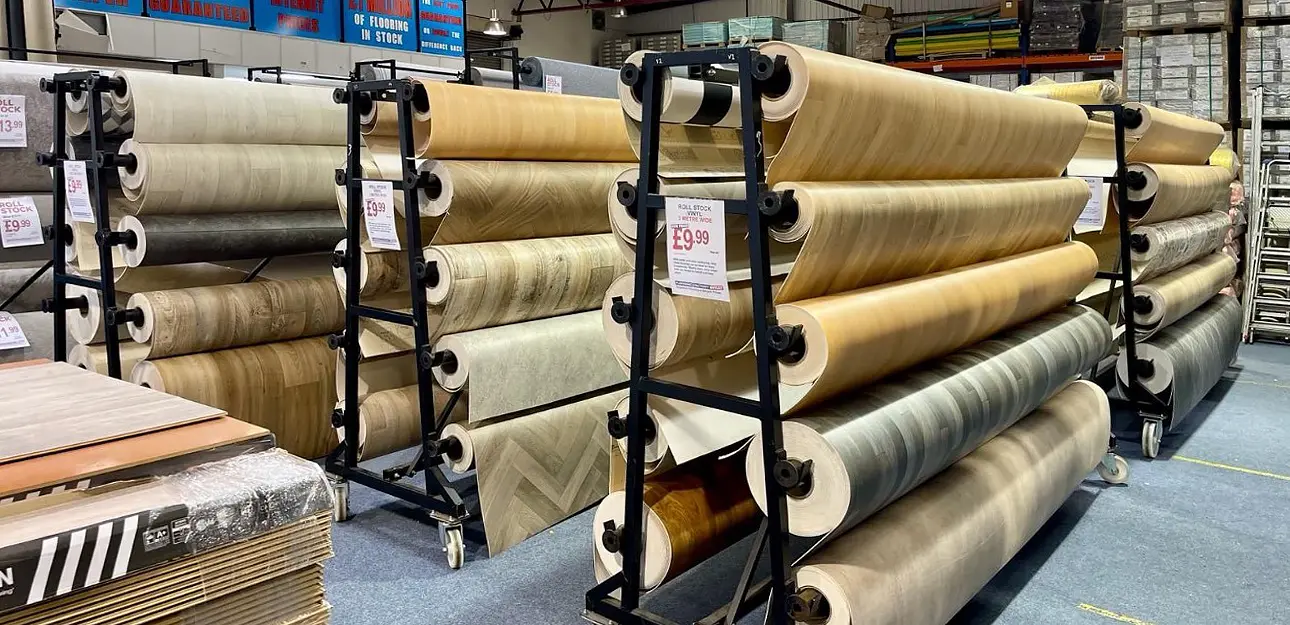 Assorted rolls of sheet vinyl flooring in various colors available at Flooring Factory Outlet Showroom in Croydon.