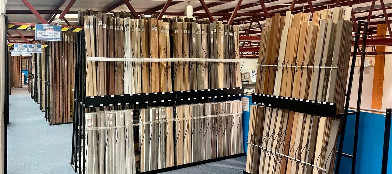 Flooring Factory Outlet showroom in Croydon showcasing large stocks of flooring accessories, neatly displayed to complement a variety of flooring options.