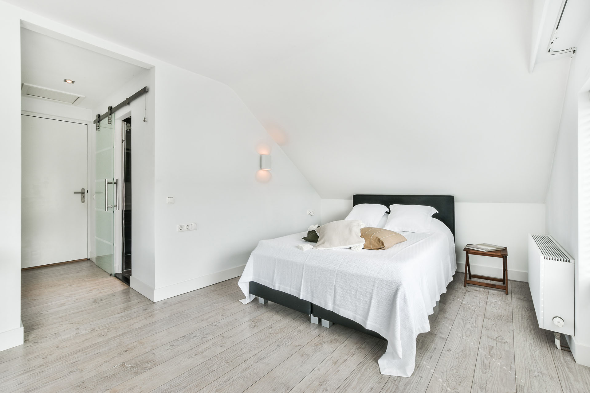 A beautiful modern bedroom in white colors